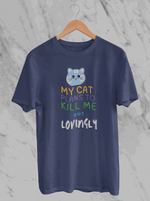My Cat Plans To Kill Me But Lovingly (Unisex T-Shirt)